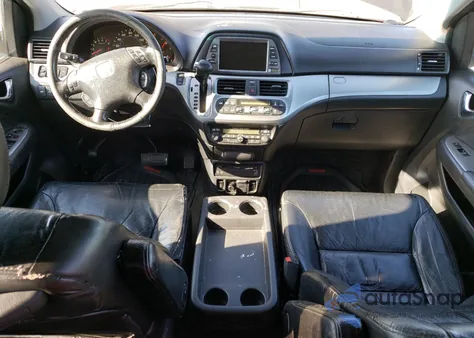 2010 Honda Odyssey Touring z USA, uszkodzony, nr VIN 5FNRL3H91AB091110